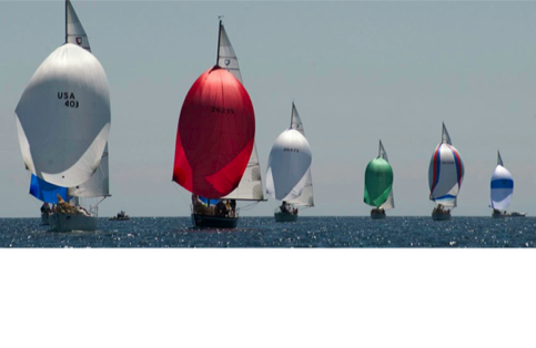 Line of sailboats with spinnakers